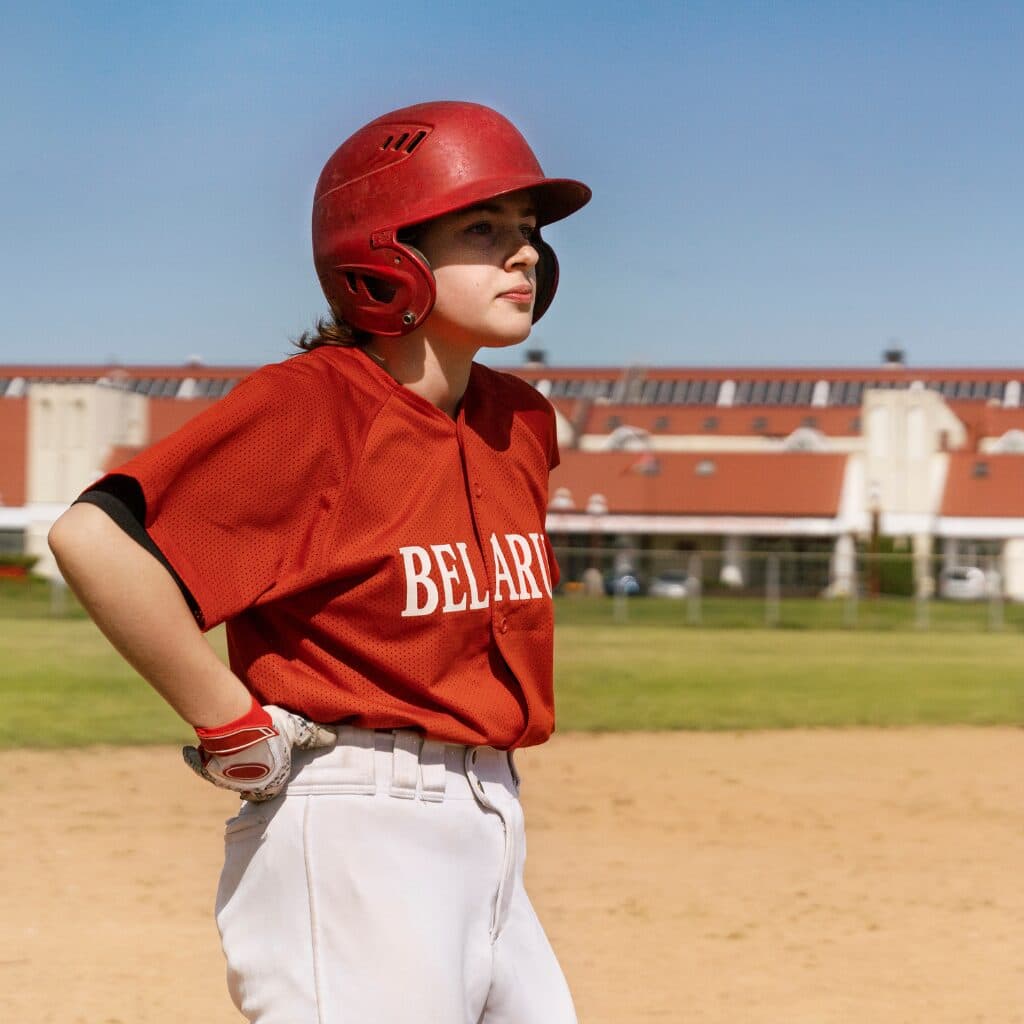 stacked softball jerseys and pants athletic sports fabric
