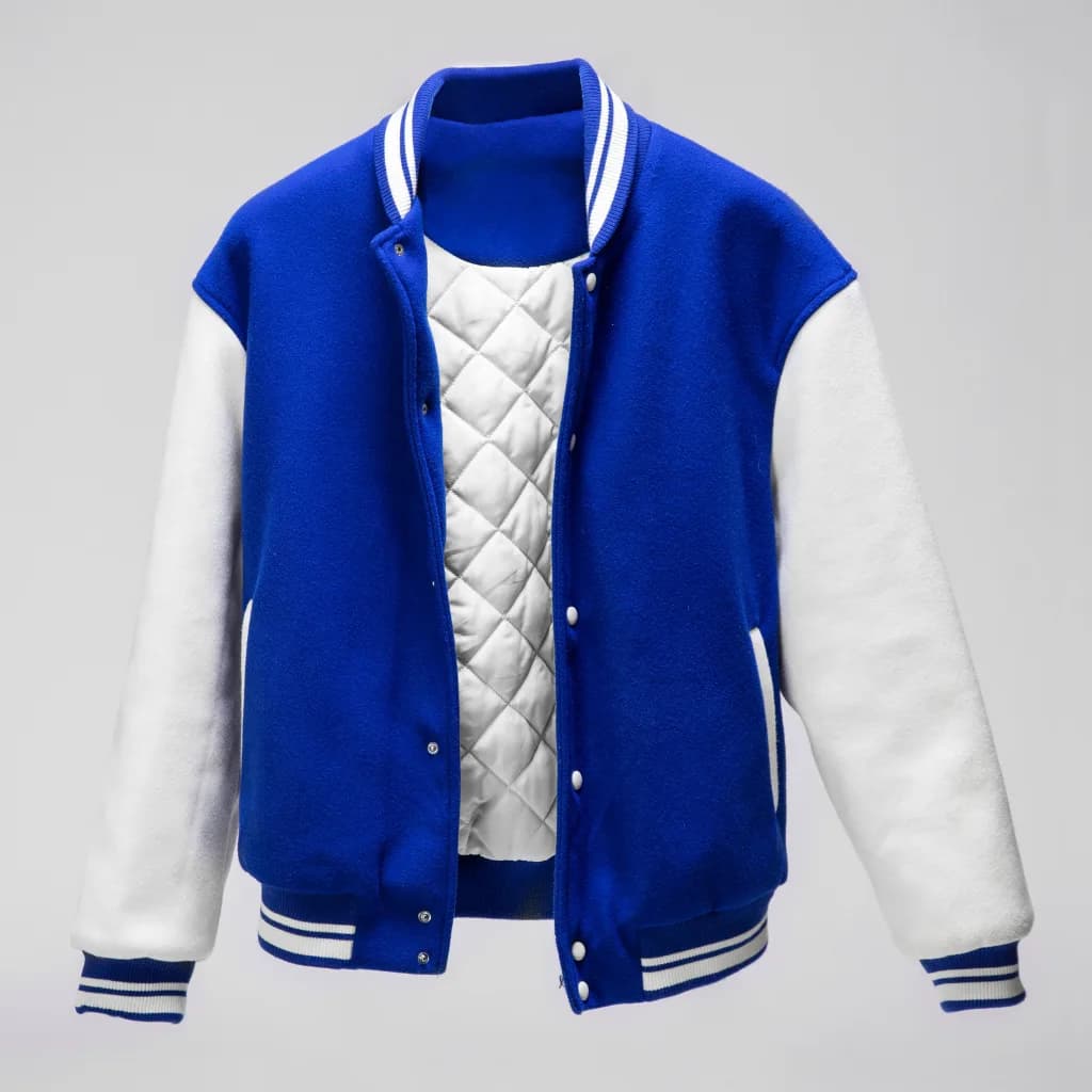 Royal blue varsity jacket with white sleeves, striped rib trims and a white quilted lining