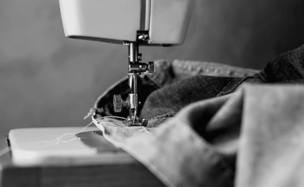 Tailor sewing machine custom apparel craftsmanship