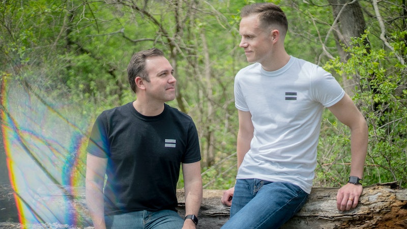 2 boys wearing white and black t shirts