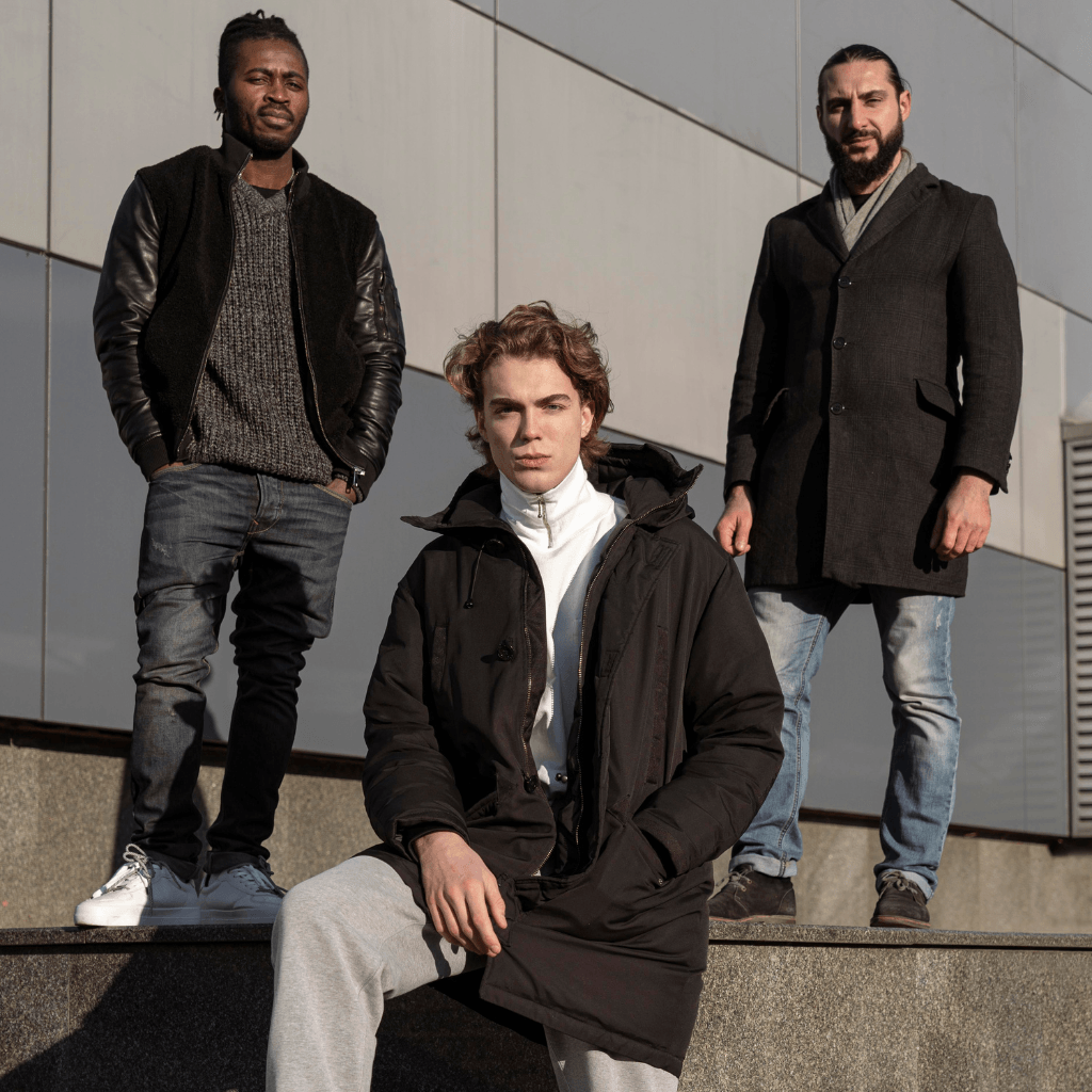 Male models wearing Nevear custom jacket outdoors
